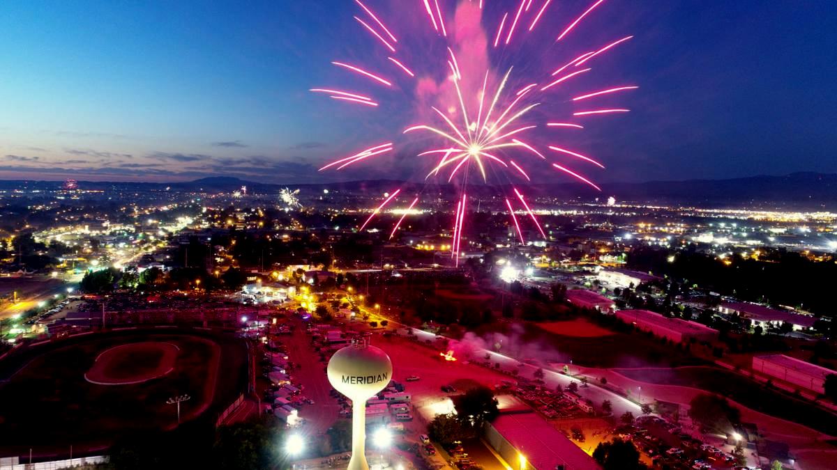 Professional Fireworks show over the Meridian Watertower near Storey Park.